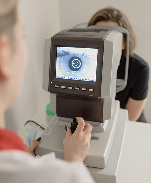 woman receiving eye exam